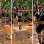 video-de-mae-atravessando-ponte-com-filha-no-colo-durante-prova-de-corrida-viraliza-e-divide-opinioes-na-internet