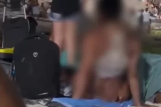 casal-e-abordado-pela-pm-durante-ato-sexual-em-praia-no-rj;-veja