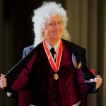 estados-unidos-e-um-lugar-perigoso-para-se-estar-hoje,-afirma-guitarrista-do-queen