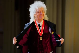 estados-unidos-e-um-lugar-perigoso-para-se-estar-hoje,-afirma-guitarrista-do-queen