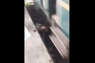 pai-salta-nos-trilhos-do-trem-para-salvar-o-filho-bebe;-video