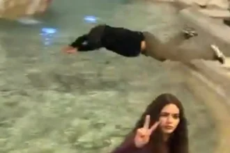 video:-turista-e-preso-na-italia-apos-mergulhar-na-fontana-di-trevi