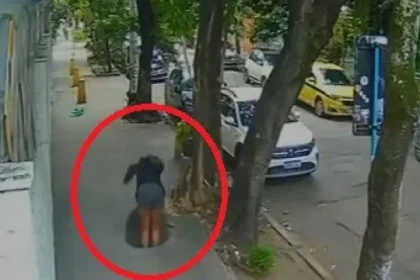 mulher-cai-em-bueiro-no-rio-e-fica-presa-apos-tampa-se-fechar;-veja