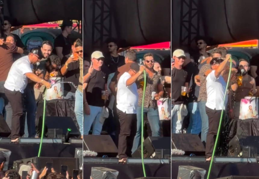 sertanejo-henrique-e-xand-aviao-aliviam-o-calor-com-banho-no-palco-durante-show-em-palmas;